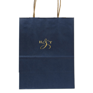 Indulge in luxury with the Elegant Ampersand Gift Bag, where initials transform into an exquisite logo. Centered around a lavishly designed ampersand that swirls into an artistic loop, this gift bag exudes a sophisticated statement of union. 