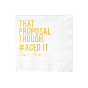 The That Proposal Though Napkin playfully celebrates a perfectly executed engagement plan. Emblazoned with "THAT PROPOSAL THOUGH. #ACED IT," it humorously nods to the elaborate productions of modern proposals. The couple's names add a personal touch, making this design a charming memento of a successful Proposal! 