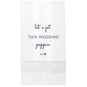 The Poppin' Wedding Bag features playful mixed typography with casual script reading “let’s get poppin’” and clean block lettering reading “this wedding,” for a fun, modern look. Grab it to add personality and humor to your celebration favors. Just right for wedding receptions!