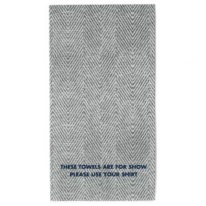 The Sarcastic Guest Towel design adds a humorous and sarcastic touch to any restroom. Boldly stating ‘THESE TOWELS ARE FOR SHOW PLEASE USE YOUR SHIRT’ in all caps, it’s sure to evoke laughter and entertain guests with its witty message.