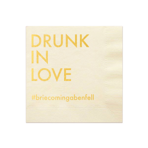 Celebrate the joy of love with the Drunk in Love Hashtag Napkin. This design features “DRUNK IN LOVE” in bold, large letters, creating a playful and euphoric atmosphere. Below, create a trendy hashtag, adding a modern, personalized touch. This napkin combines romance with contemporary flair, ideal for memorable, social media-ready moments."