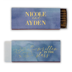 The Written in the Stars Matchbox dazzles with celestial charm. One side features "written in the stars" in twinkling script amidst a constellation graphic, capturing a heavenly feel. The other side proudly displays the event stars' names in bold all-caps, anchoring the cosmic theme.