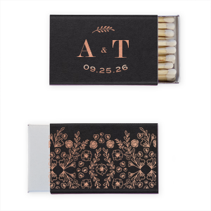 The Leaf Initials Matchbook design showcases a sleek, modern font for the couple's initials, artfully linked by a diminutive ampersand. An elegantly arched bough floats above, adding a natural touch. Below, the event date subtly arcs, complementing the design's fluidity and contemporary charm.