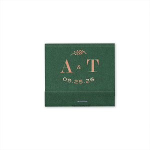 The Leaf Initials Matchbook design showcases a sleek, modern font for the couple's initials, artfully linked by a diminutive ampersand. An elegantly arched bough floats above, adding a natural touch. Below, the event date subtly arcs, complementing the design's fluidity and contemporary charm.