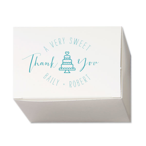 Package your gratitude with the Sweet Thank You Gift Box, featuring a whimsical wedding cake graphic and a heartfelt message. 'A Very Sweet Thank You' encircles the design, with the couple’s names sweetly finishing off this token of appreciation.