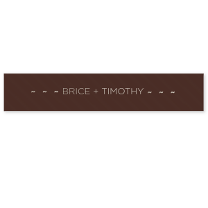Wrap your wedding in personalized elegance with the Paradise Wedding Ribbon, an endless embrace of the couple's names. This bespoke detail adds a luxe finish to your décor, weaving the essence of the couple throughout the celebration's fabric.
