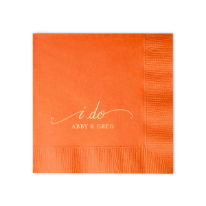 The I Do Flourish Name Napkin design artistically transforms the iconic wedding vow into a visual centerpiece. Flourished script forms an umbrella-like frame around "I Do," highlighting the couple's names, which are in a contrasting all-caps block font. This napkin combines elegance with artistic expression in a memorable keepsake.