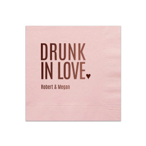 The Drunk In Love Napkin playfully captures the euphoria of love, featuring "DRUNK IN LOVE" in bold, large letters, accented with a solid heart. Below, the couple's names in smaller block letters add a personalized touch, symbolizing the blissful, stress-free joy found in love and celebration.