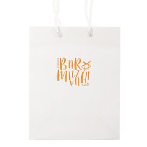 Pack the celebration with the Mitzvah Fun Bag, bursting with a lively script fit for Bat or Bar Mitzvah festivities. The exuberant flourishes embracing the celebrant's name and date convey the vibrant spirit of this momentous occasion.