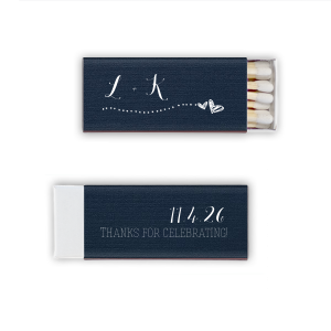 Light the spark of love with the Two Hearts Wedding Match, where initials trail to duet hearts, symbolizing a shared journey. 'Thanks for Celebrating' on the reverse captures the couple’s generous essence, celebrating their union with whimsical charm.