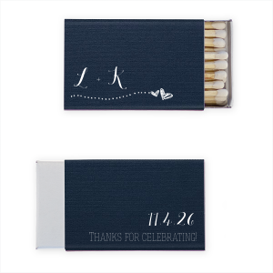 Light the spark of love with the Two Hearts Wedding Match, where initials trail to duet hearts, symbolizing a shared journey. 'Thanks for Celebrating' on the reverse captures the couple’s generous essence, celebrating their union with whimsical charm.