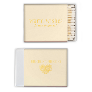Ignite a hearthside glow with the Warm Wishes Matchbox, extending a toasty greeting to all. The family name and pinecone cluster on the reverse side kindle the essence of homely cheer, perfect for fireside gatherings and festive nights.