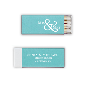 Illuminate your union with the Mr. & Mrs. Matchbox. Bold, artistic ampersand connecting two paths into one. An elegant statement for your special day, these matchboxes carry the spark of your new beginning, perfect for wedding celebrations.