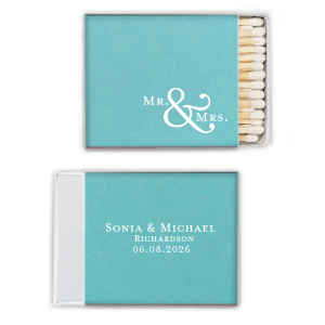Illuminate your union with the Mr. & Mrs. Matchbox. Bold, artistic ampersand connecting two paths into one. An elegant statement for your special day, these matchboxes carry the spark of your new beginning, perfect for wedding celebrations.