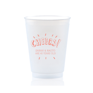 Raise a glass with the Radiant Celebration Cheers Frosted Cup, featuring "Cheers" in exuberant bubble font, surrounded by thick lines that radiate celebration. This design invites personalization with names or milestones beneath, creating a lively, festive atmosphere perfect for toasting special occasions and joyful achievements.