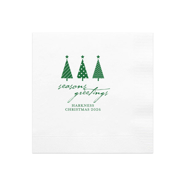 Spruce up your holiday table with the Seasons Greetings Christmas Tree Napkin, where a trio of distinctively decorated trees shines brightly. 'Seasons Greetings' unfurls in joyful script, inviting guests to share in the festive cheer of your celebration.