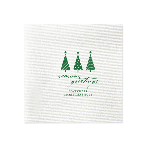 Spruce up your holiday table with the Seasons Greetings Christmas Tree Napkin, where a trio of distinctively decorated trees shines brightly. 'Seasons Greetings' unfurls in joyful script, inviting guests to share in the festive cheer of your celebration.