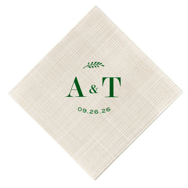 The Contemporary Leaf Monogram Wedding Napkin features elegant initials and date with a delicate botanical sprig for a refined tablescape. Choose it to elevate place settings with a polished, organic touch. Excellent for weddings or rehearsal dinners.
