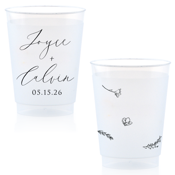 Sip in style with the Botanical Breeze Cup, blending elegance and whimsy. Modern script of the couple's names pairs with playful botanical doodles for a charming, personalized touch. Lovely for weddings, anniversaries, or celebratory toasts.