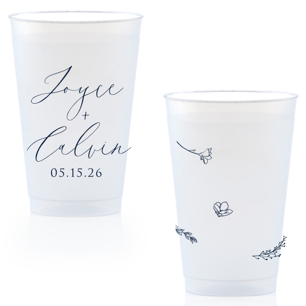 Sip in style with the Botanical Breeze Cup, blending elegance and whimsy. One side features the couple's names in prominent modern script, with the event date below. The other side delights with four playful, doodle-like botanical drawings, adding a light-hearted, charming touch to any celebration.