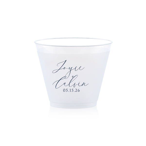 Sip in style with the Botanical Breeze Cup, blending elegance and whimsy. One side features the couple's names in prominent modern script, with the event date below. The other side delights with four playful, doodle-like botanical drawings, adding a light-hearted, charming touch to any celebration.