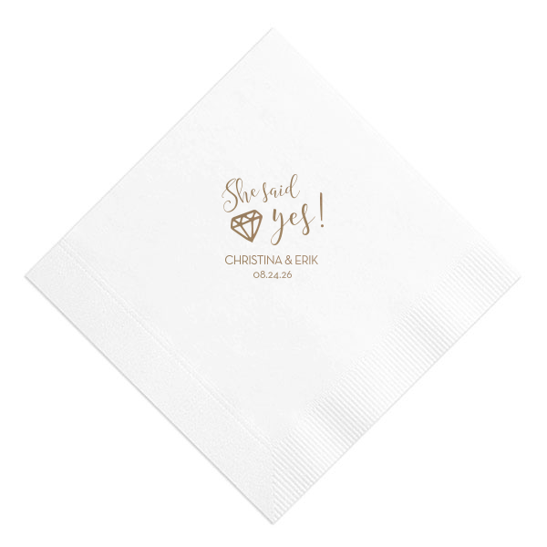 With the She Said Yes Diamond Engagement Napkin, let the fun begin! This exuberant design nestles a sparkling diamond into the joyful exclamation, perfect for celebrating a lifetime of love. Personalize with the couple's name and date for an unforgettable celebration.

