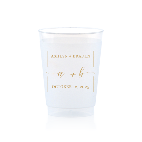 The Square Monogram Frame Cup features elegant script of the couple’s initials, paired with their names and special date within a clean rectangular border for a refined drinkware detail. Use it to elevate beverage service with a polished, personalized touch. Refined for wedding receptions or rehearsal dinners.