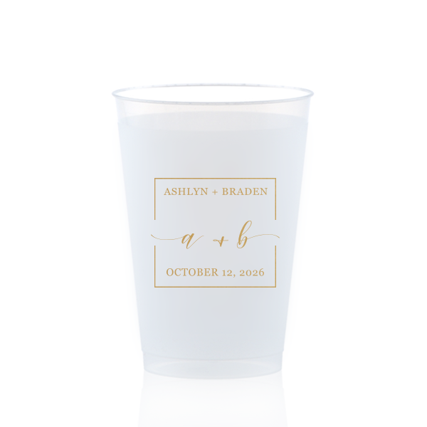 The Square Monogram Frame Cup features elegant script of the couple’s initials, paired with their names and special date within a clean rectangular border for a refined drinkware detail. Use it to elevate beverage service with a polished, personalized touch. Refined for wedding receptions or rehearsal dinners.