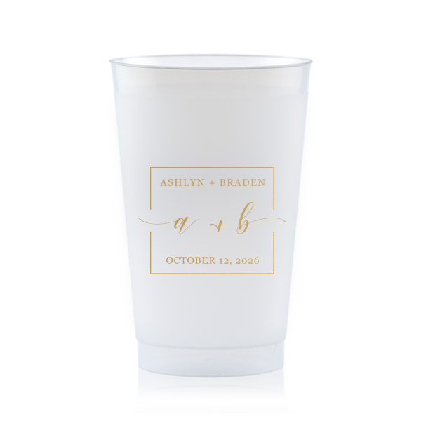 The Square Monogram Frame Cup features elegant script of the couple’s initials, paired with their names and special date within a clean rectangular border for a refined drinkware detail. Use it to elevate beverage service with a polished, personalized touch. Refined for wedding receptions or rehearsal dinners.