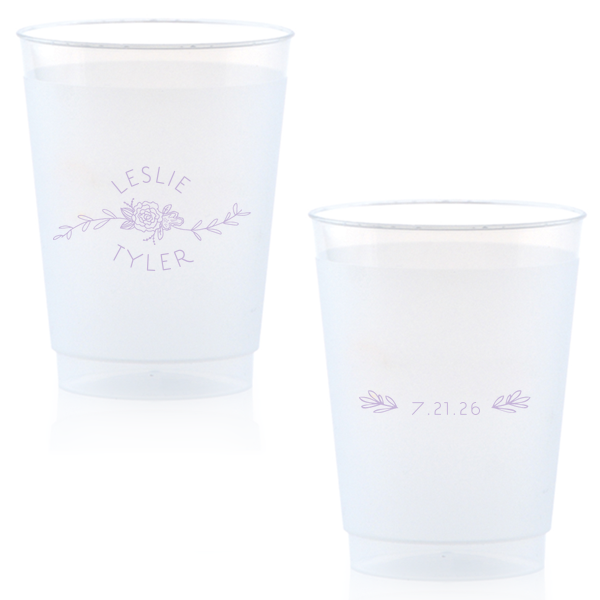 Captivate your guests with the Peony Flourish Names Frosted Cup, featuring a charming heart-leaf flourish and a central peony. This elegantly stacked design beautifully intertwines the couple's names, creating an air of sweet simplicity and sophistication for your memorable celebration.