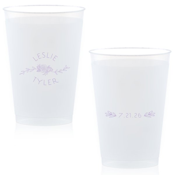 Captivate your guests with the Peony Flourish Names Frosted Cup, featuring a charming heart-leaf flourish and a central peony. This elegantly stacked design beautifully intertwines the couple's names, creating an air of sweet simplicity and sophistication for your memorable celebration.
