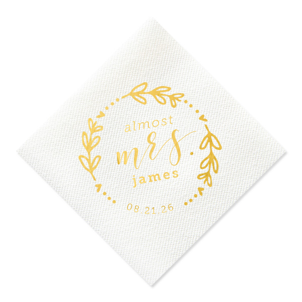 The Almost Mrs Heart Frame Bridal Shower Napkin joyfully heralds the bride-to-be's journey from Miss to Mrs. Encircled by a heart-leaf frame, the flowing, swirling script of "Mrs." takes center stage, accompanied by her soon-to-be last name and the wedding date. A charming, celebratory design!