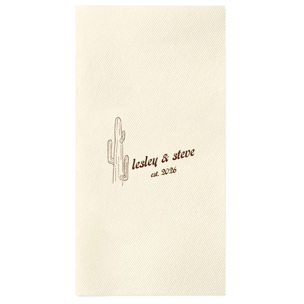 The Desert Sunburst Cactus Napkin features a minimalist cactus illustration and rustic typography of the couple’s names and event date for a charming western-inspired touch. Customize yours to bring personality and cohesive style to your celebration. A natural choice for weddings or outdoor receptions.