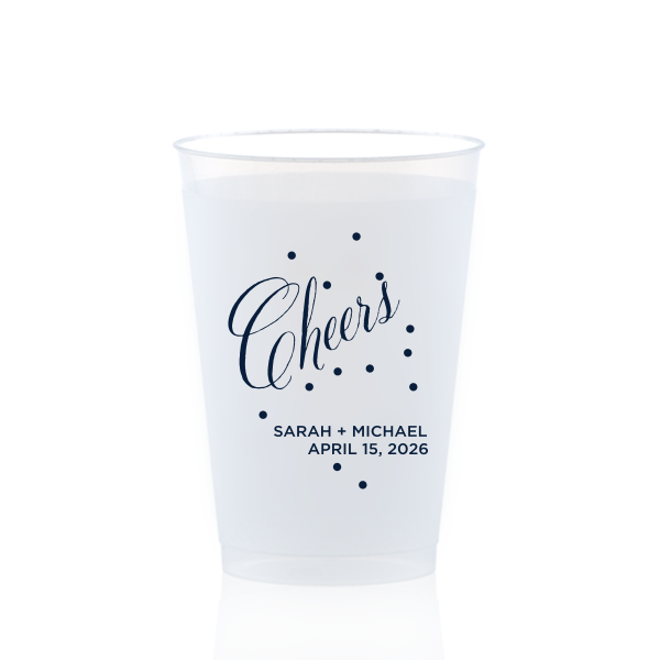 Toast in style with the Cheers Bubble Cup, brimming with effervescence. The word "Cheers" is beautifully rendered in swirling script, surrounded by lively bubble dots, capturing a sense of bubbly joy. Below, the couple's names and event date in block font add a personalized touch to this vibrant celebratory design.