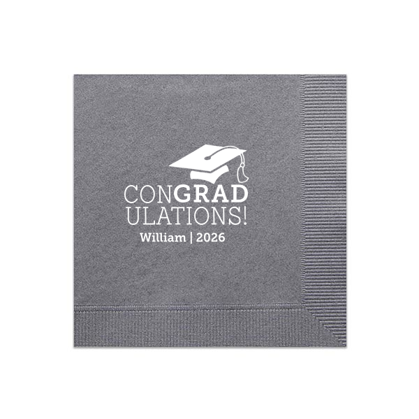 The ConGRADulations! Cap Napkin features a classic cap illustration paired with bold congratulatory lettering and a custom name and year detail. Order yours to add a polished touch to your party table and celebrate in style. Spot-on for graduation parties!