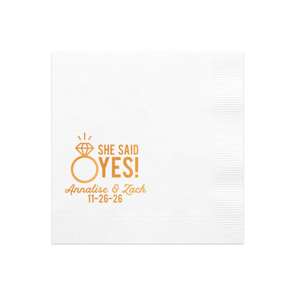 The She Said Yes! Diamond Ring Napkin features bold celebratory lettering, your name and special date, elegant script,t and a sparkling ring icon for a joyful announcement detail. Set it out to share the excitement and invite guests to celebrate together. Just right for engagement parties, or proposal celebrations!
