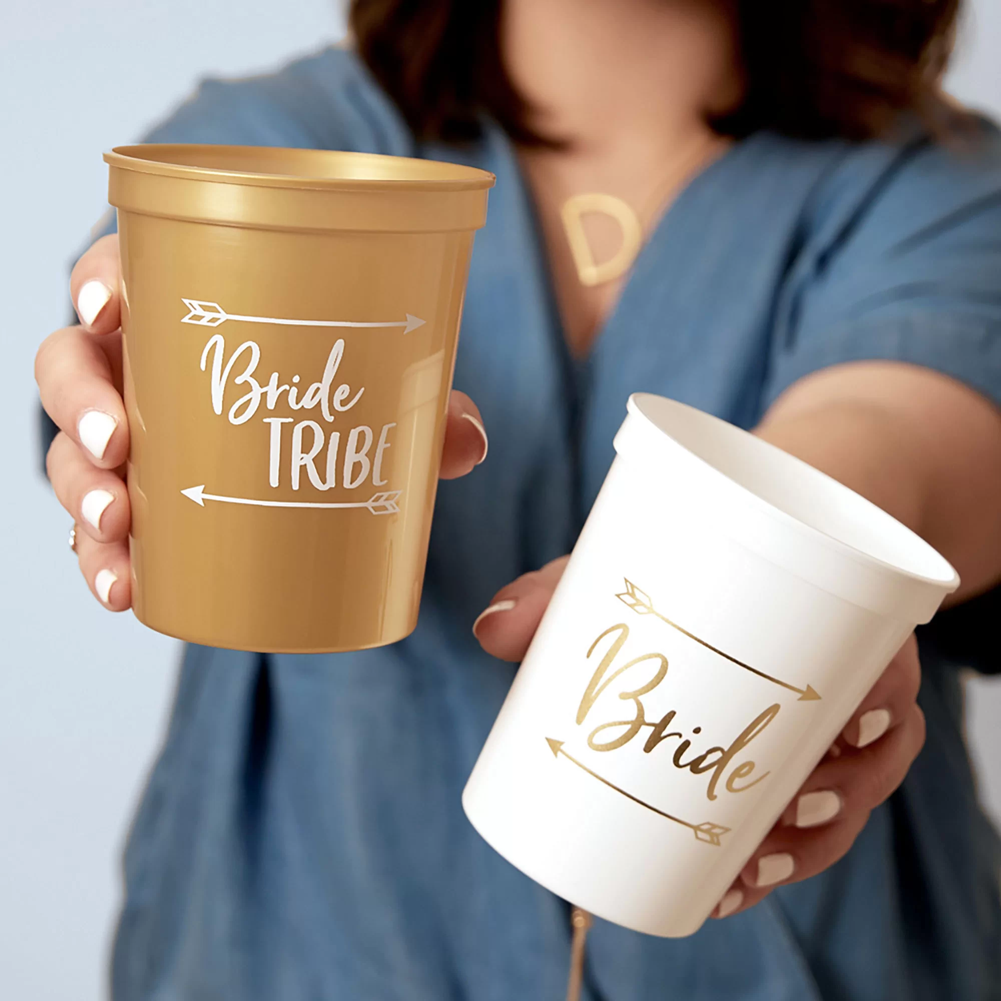 Person holding a Bride and Tribe Cup