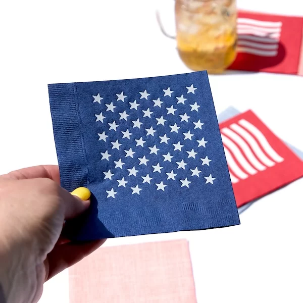 Close up of blue napkins with white stars