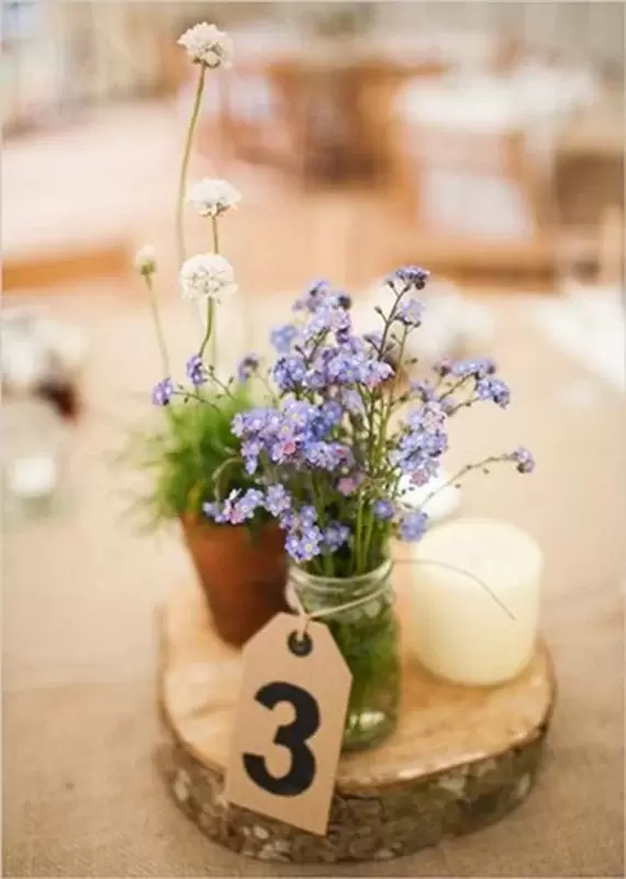 Wedding wood centerpiece with wild flowers