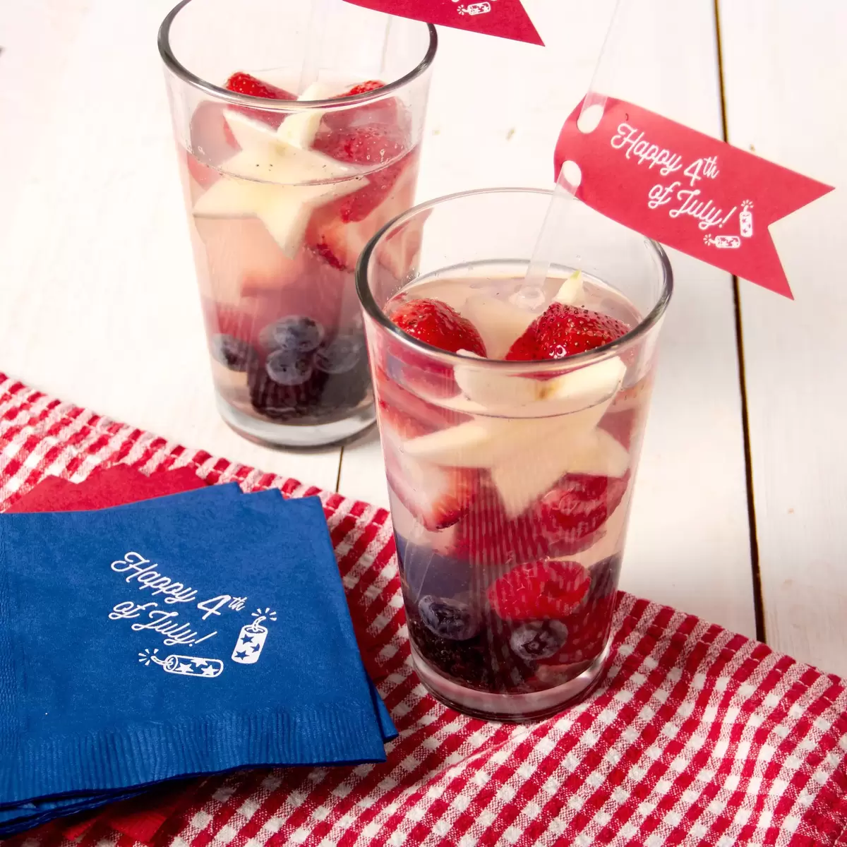 4th of July themed cocktails with personalized party napkins perfect for a picnic or bbq