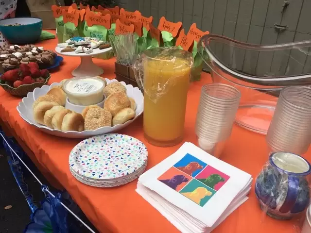personalized goodie bags with a dog bone and calligraphy names for a dog party