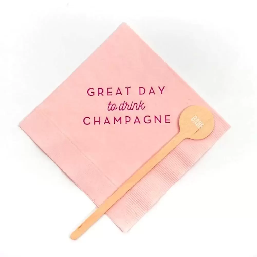 personalized cocktail napkins and stir sticks for a creative housewarming gift