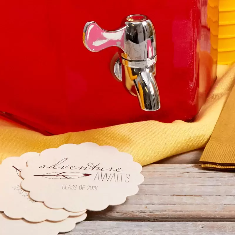 drink bar with custom coasters for boho graduation party theme