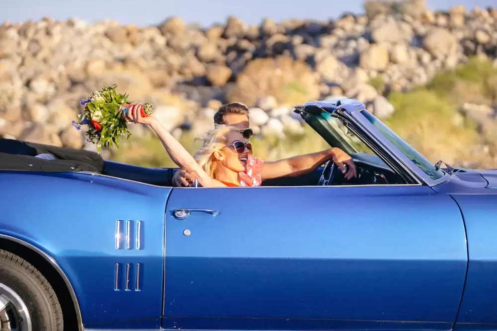 boho desert wedding getaway car