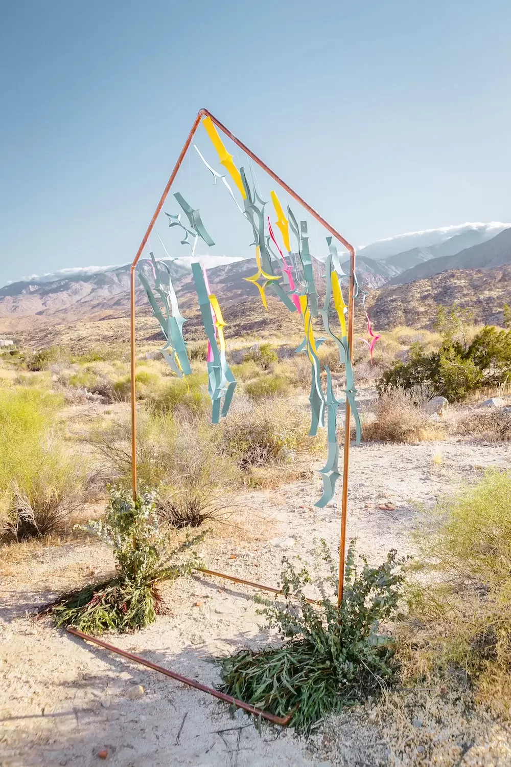 boho wedding gold arch with ribbon streamers