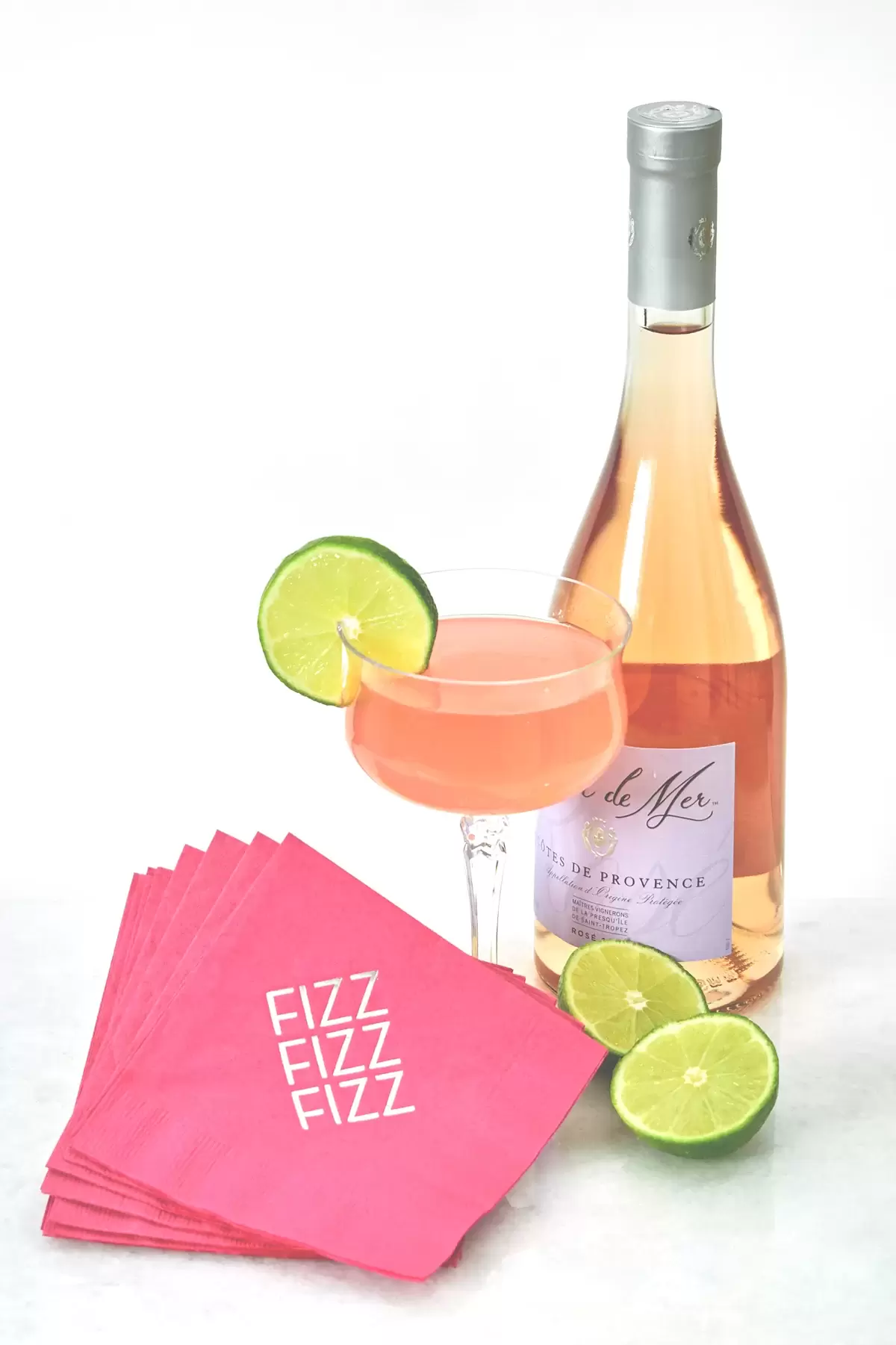 Rosè Cosmo cocktail recipe with personalized cocktail napkin