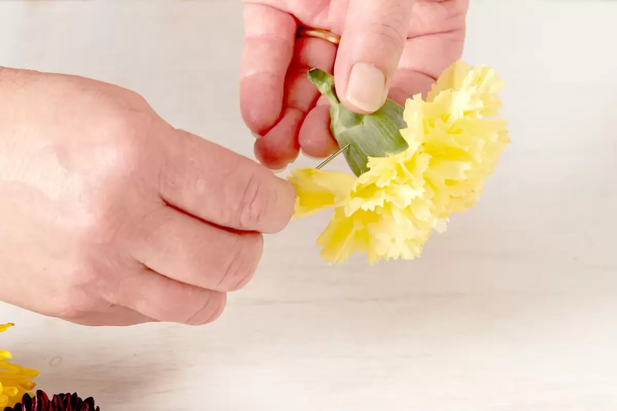 hanging flower backdrop DIY in process