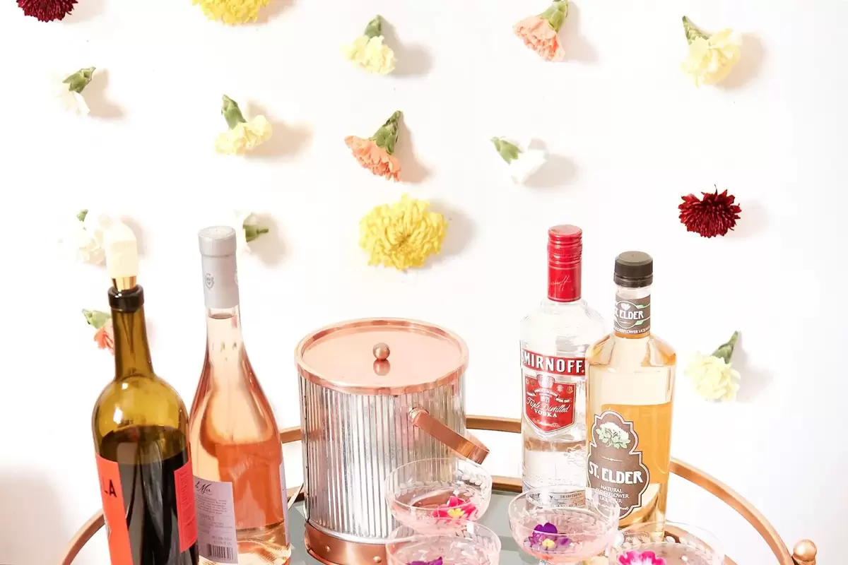 finished DIY hanging flower backdrop by For Your Party