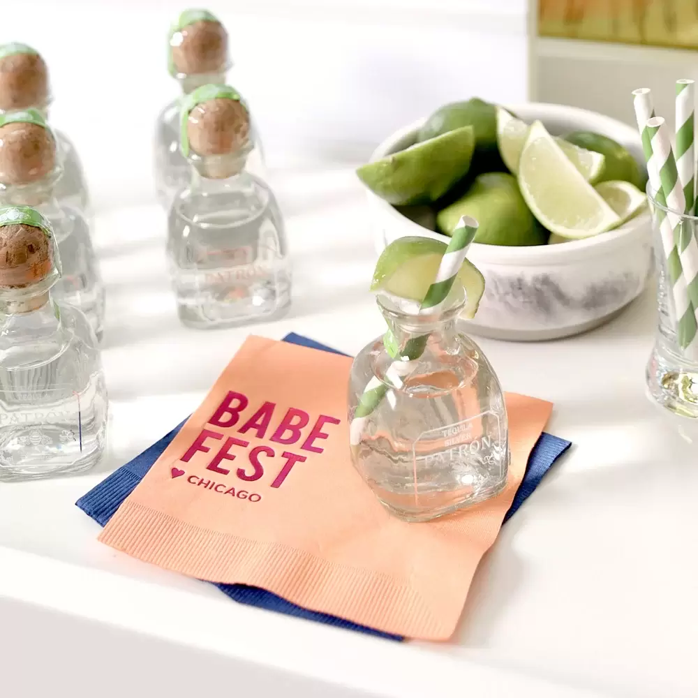 bachelorette party bar cart with personalized cocktail napkins