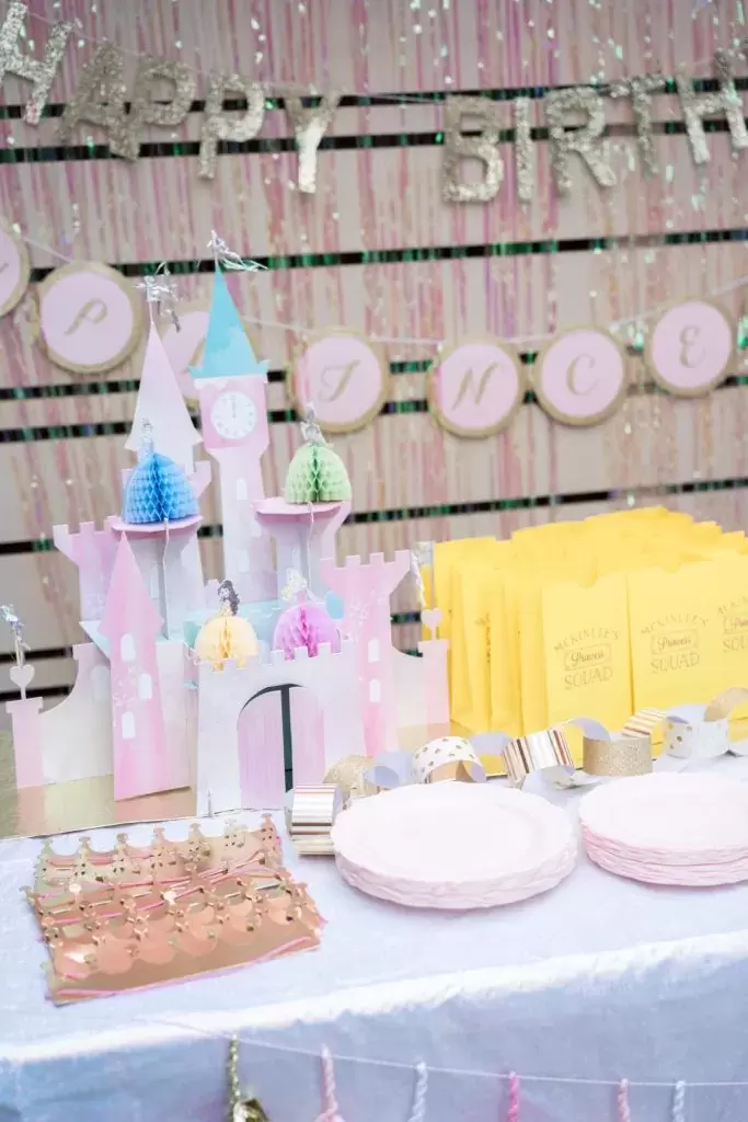 princess party dessert table with party favor bags